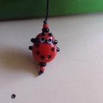 close up of red ladybug bookmark
